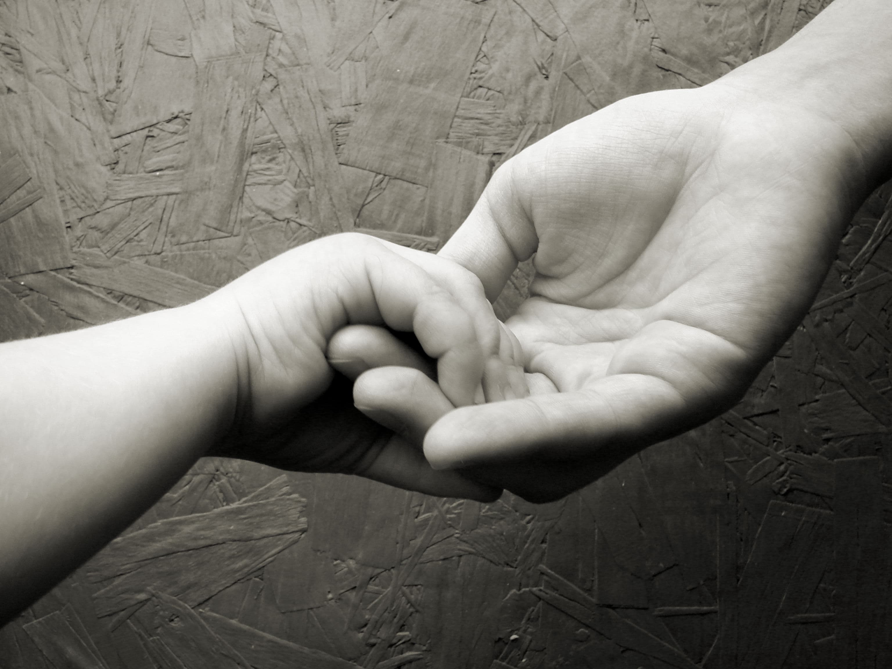 Hands holding a set of keys